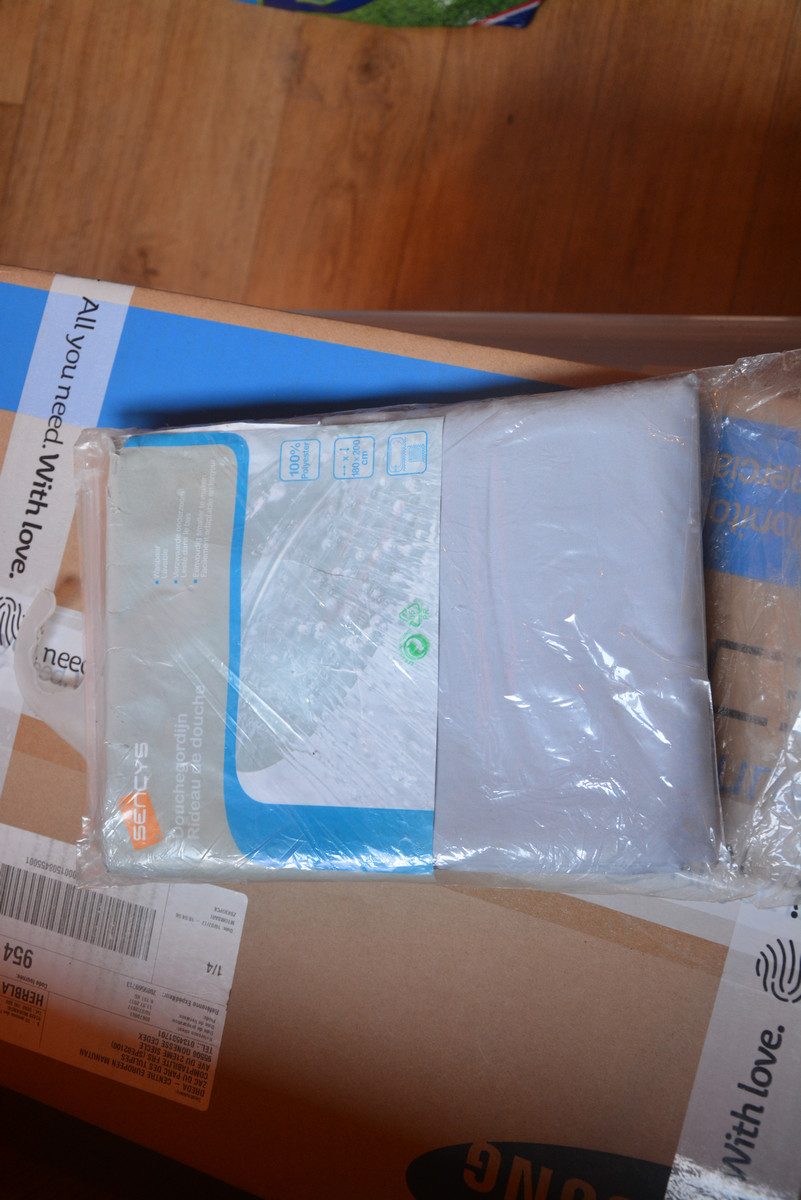321. NIEUW douchegordijn zilvergrijs verzending inbegrepen