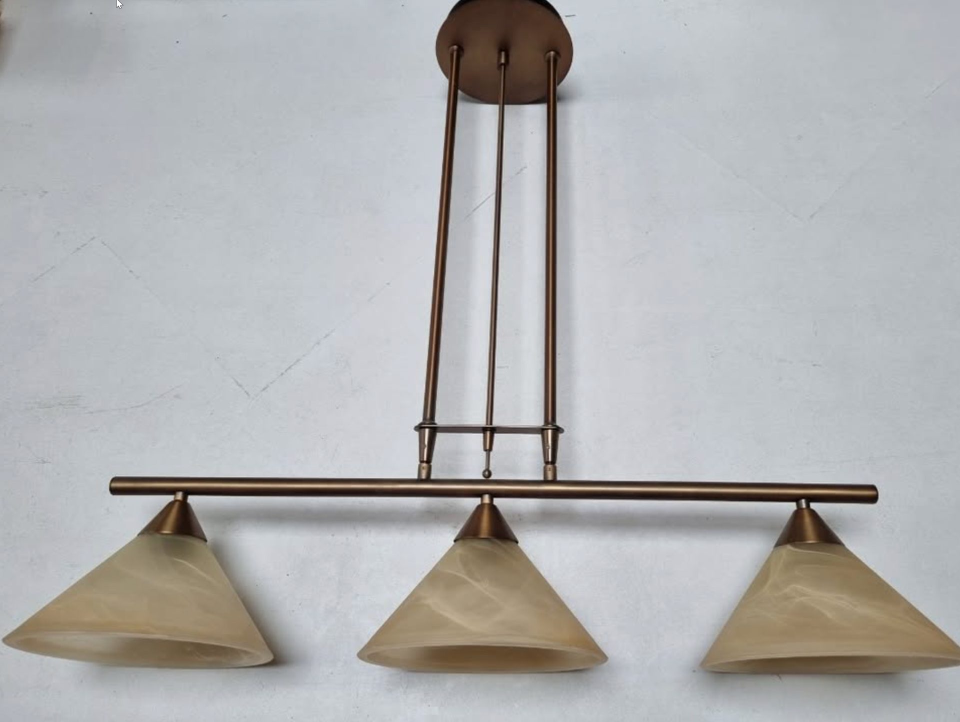 Stijlvolle hanglamp met drie lampenkappen